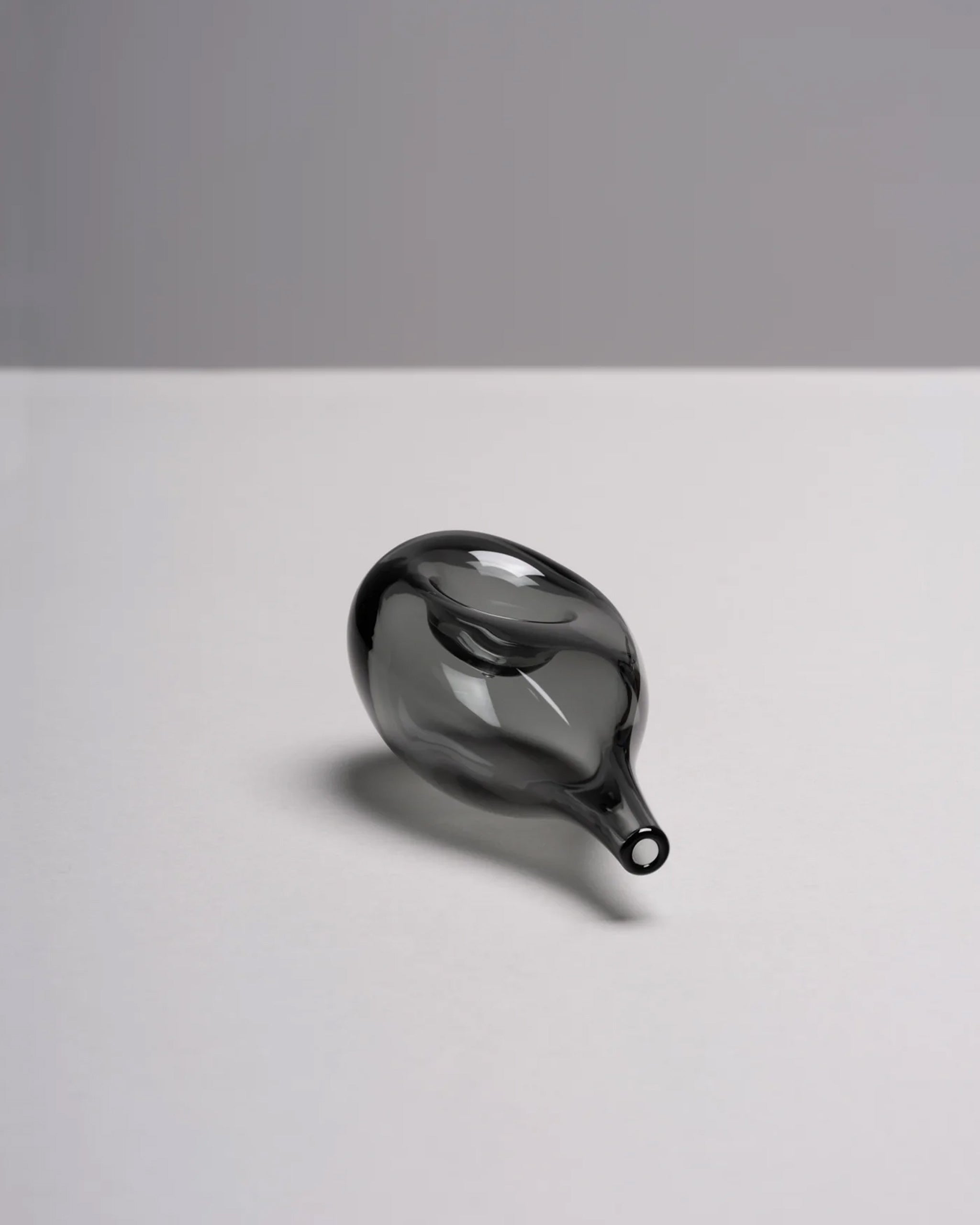 Blown glass Cloud Pipe photographed on a white background to highlight its sculptural, cloud-like form.