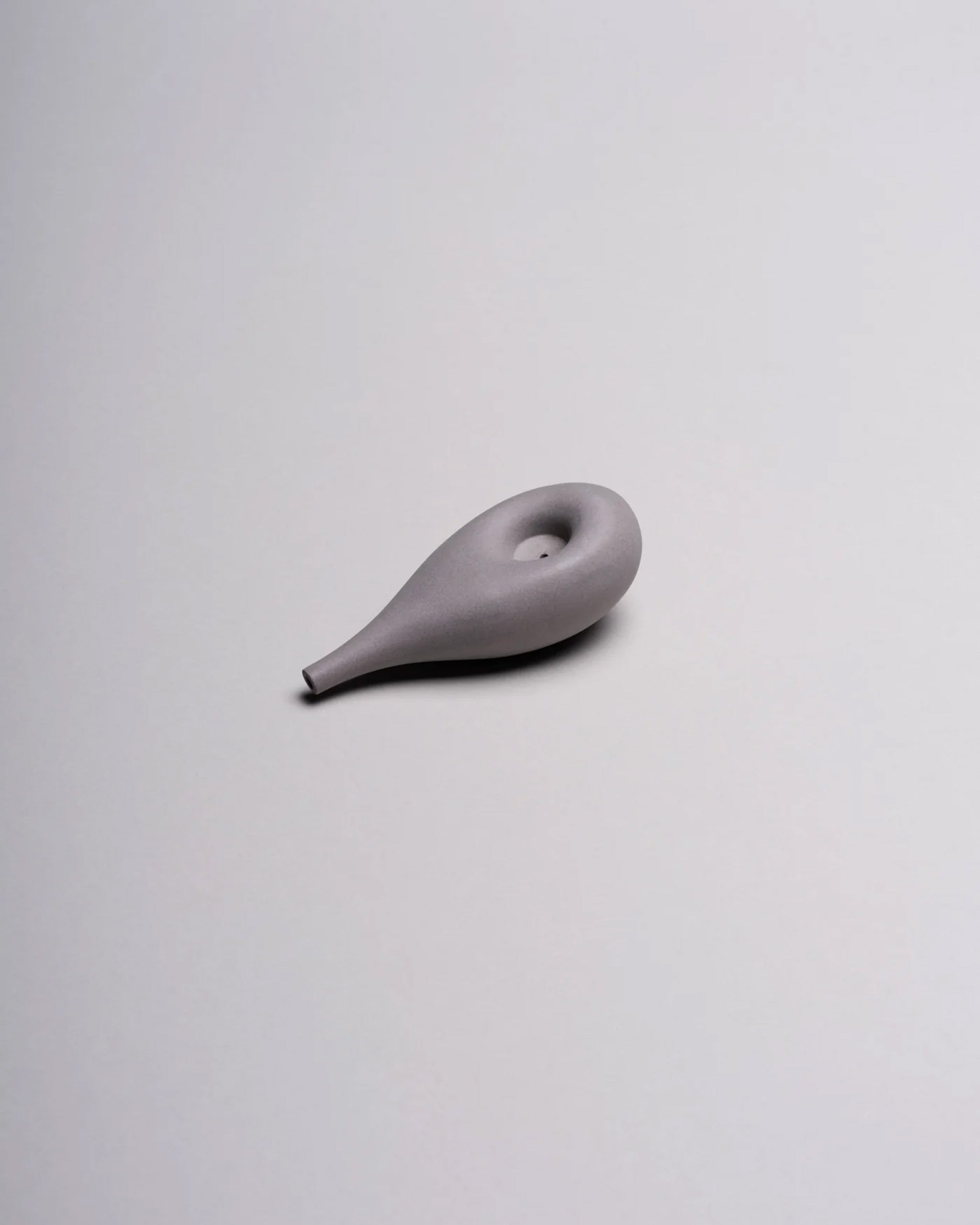 Porcelain Cloud Pipe photographed on a white background to highlight its sculptural, cloud-like form.