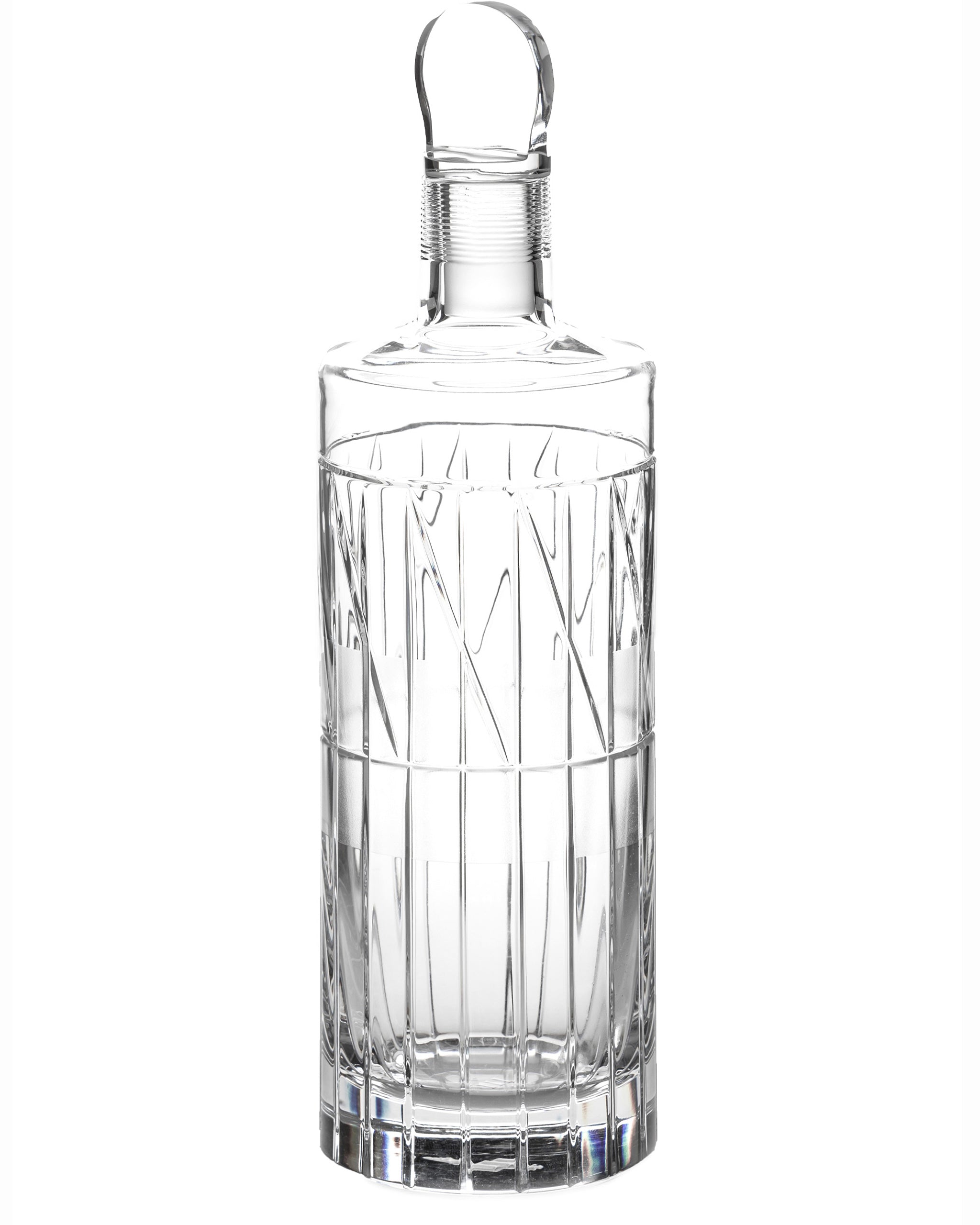 Hand-blown whiskey decanter with stopper, modern cut crystal design on white background.