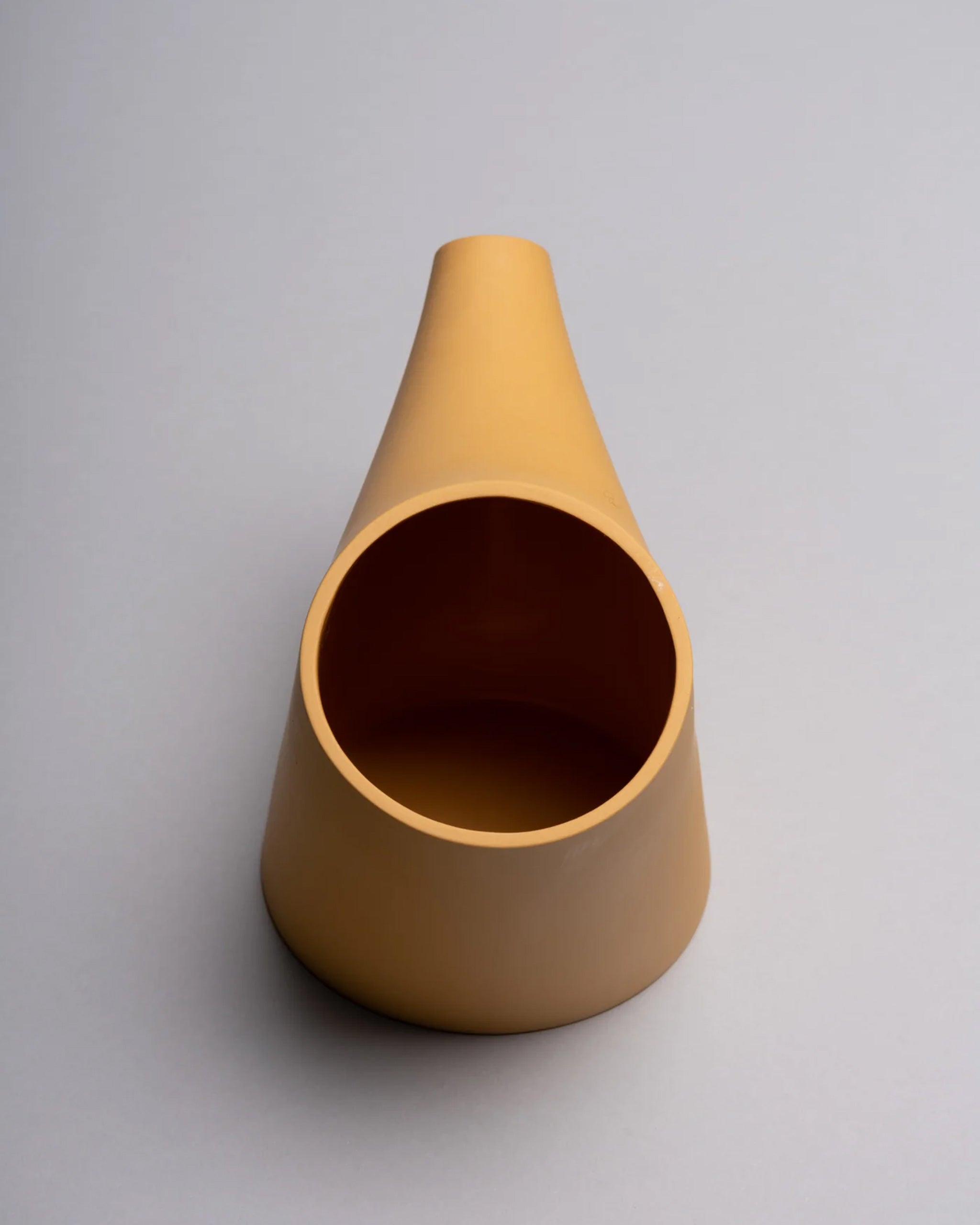 HopStep pot in ochre porcelain, perfect for oil, sake, tea or infusing shown on a white background.