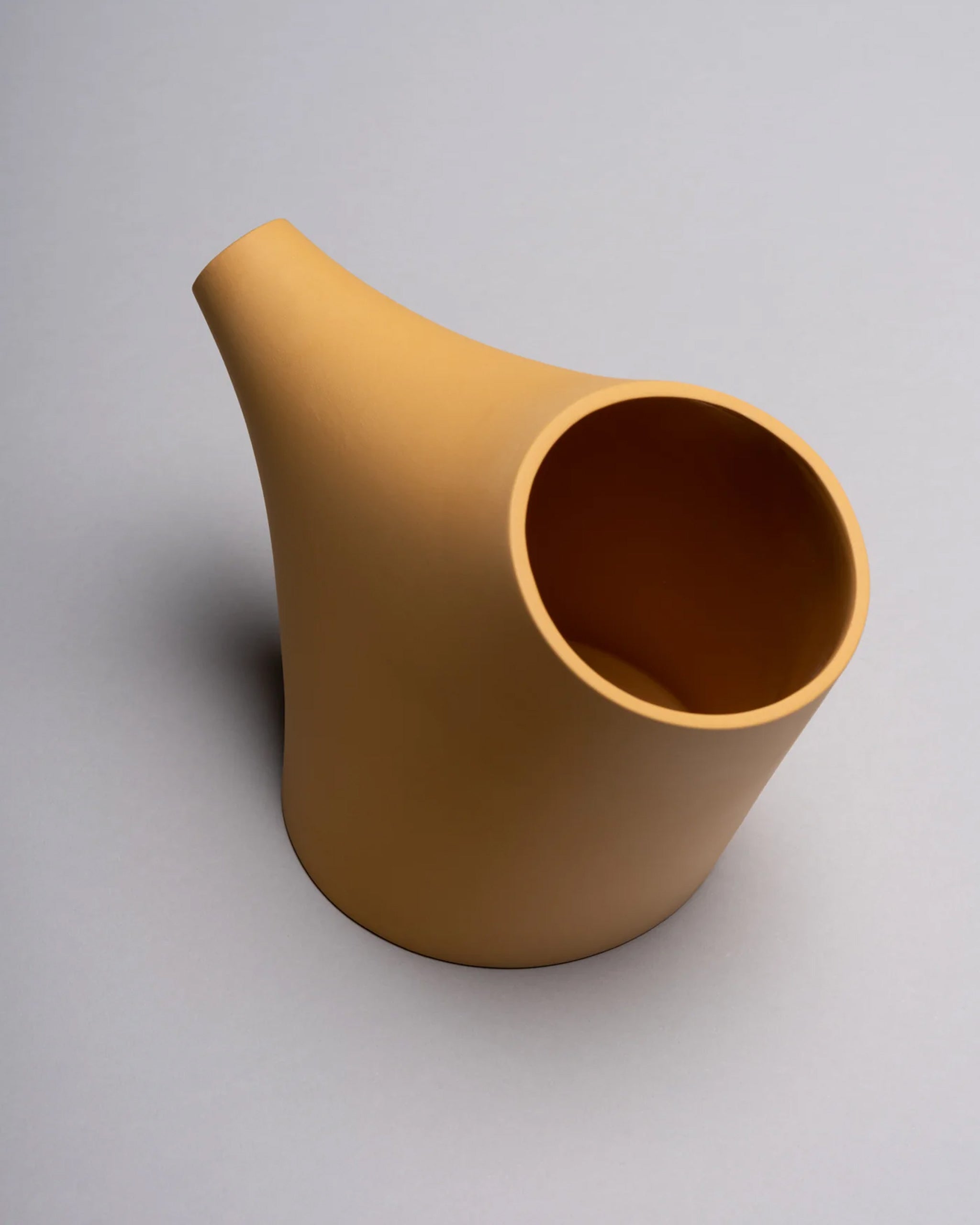 HopStep pot in ochre porcelain, perfect for oil, sake, tea or infusing shown on a white background.