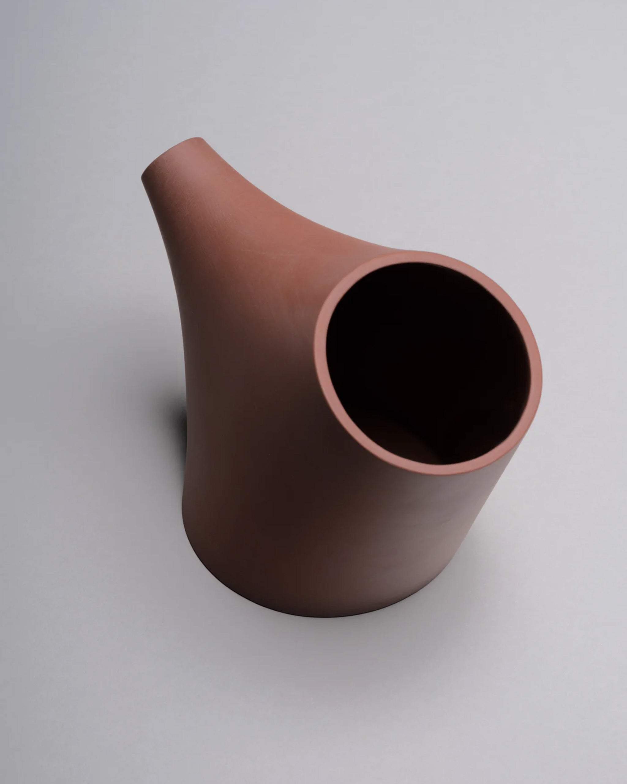 HopStep pot in red porcelain, perfect for oil, sake, tea or infusing shown on a white background.