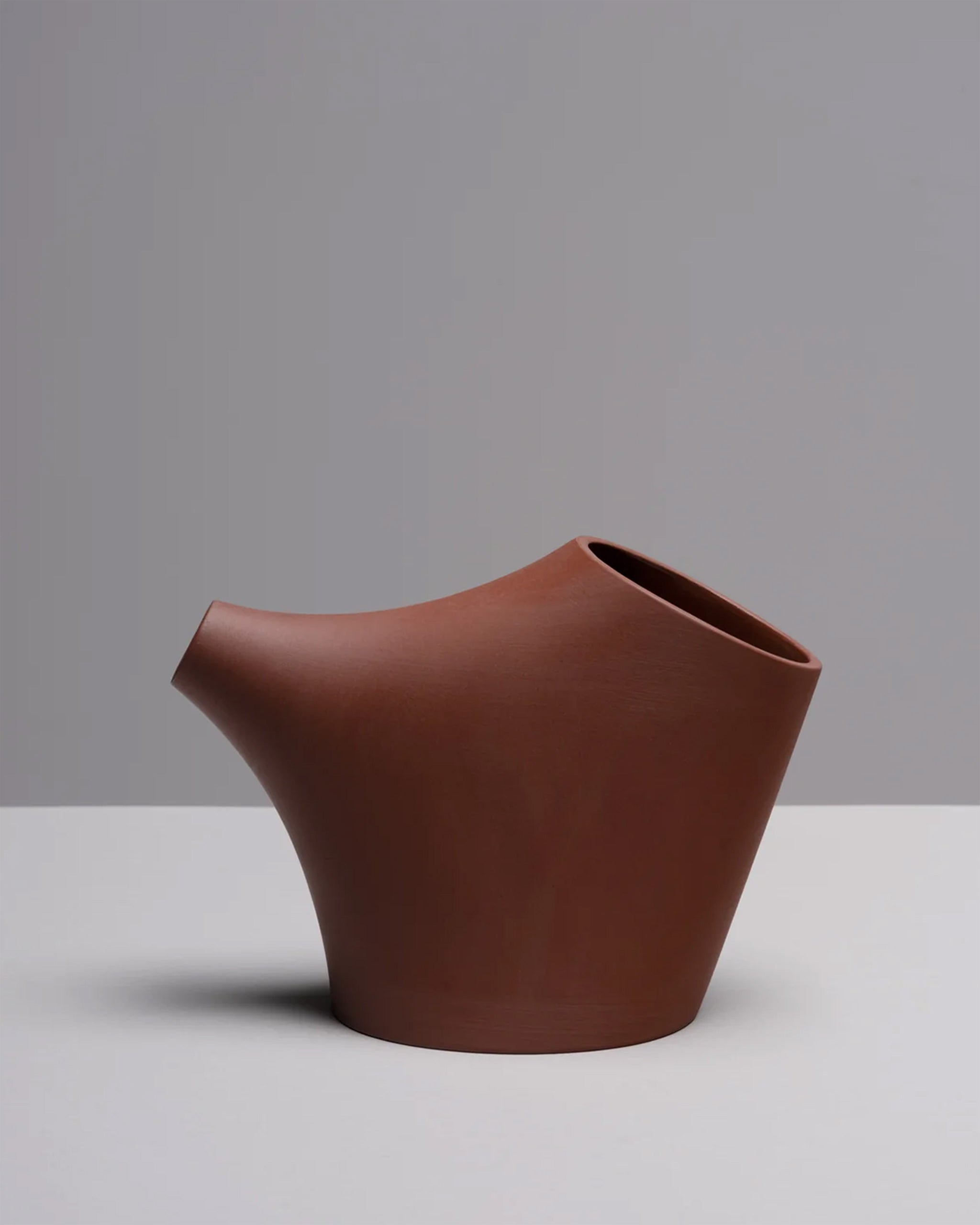 HopStep pot in red porcelain, perfect for oil, sake, tea or infusing shown on a white background.