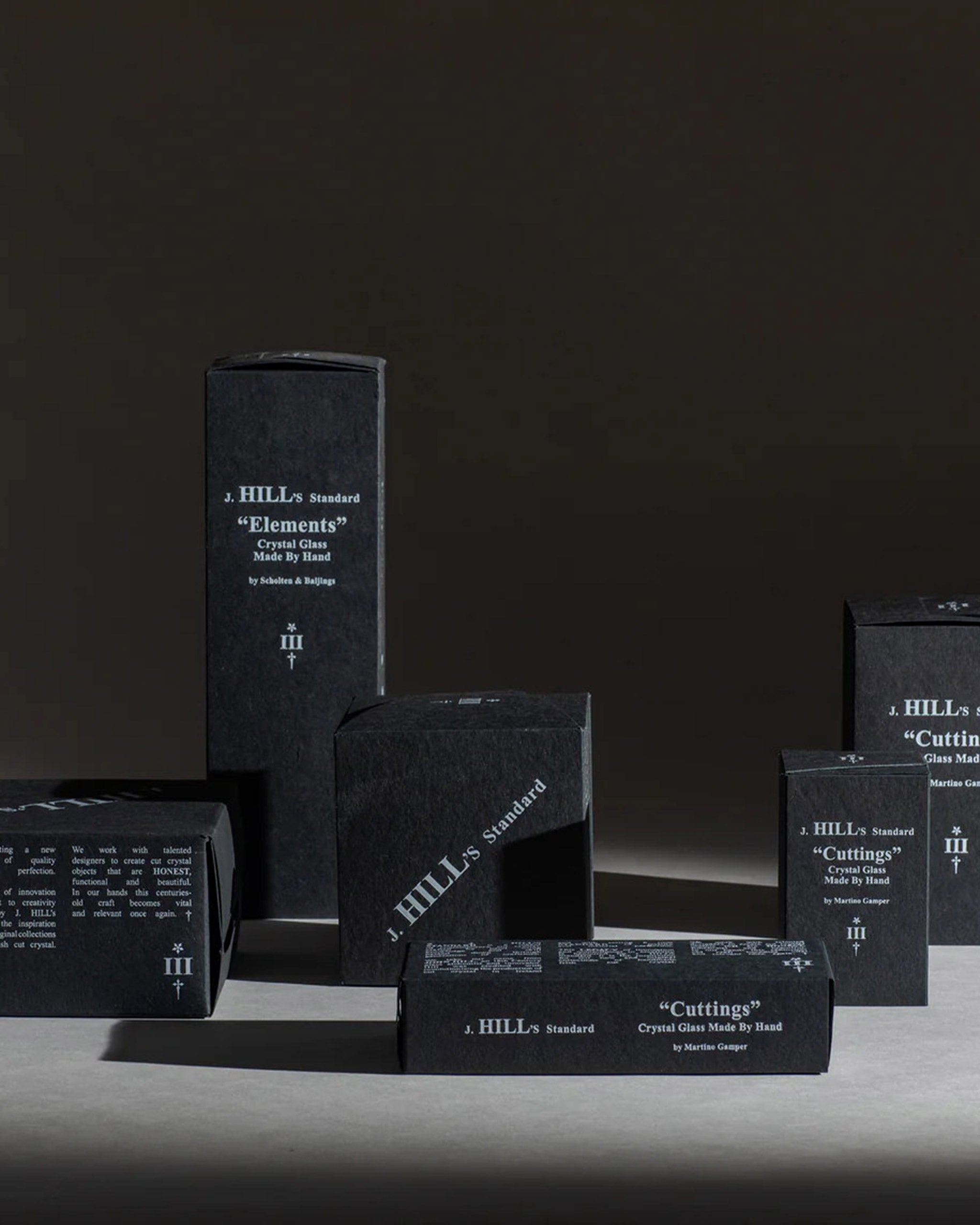 Matt black packaging with branding for handcrafted Irish crystal glassware.