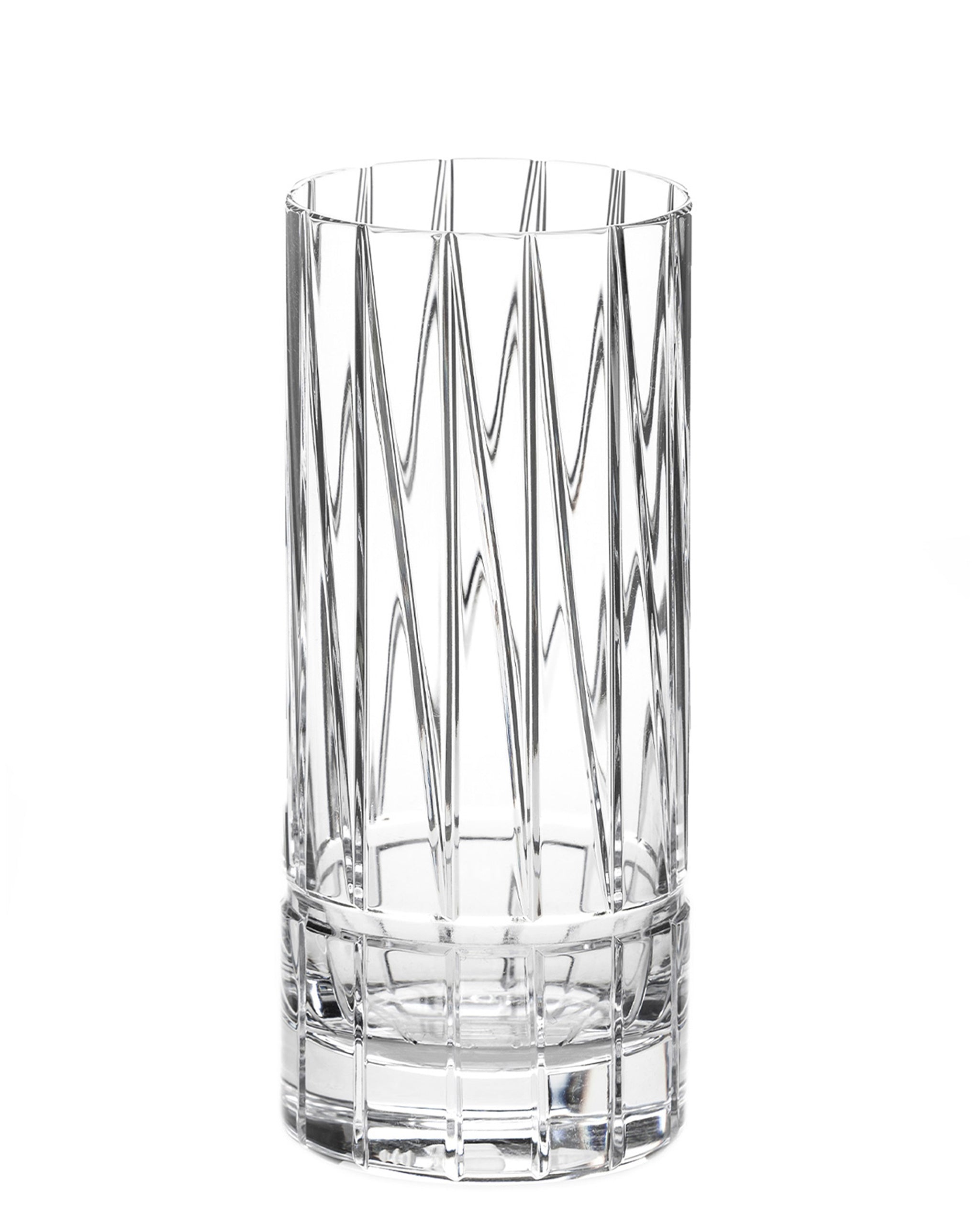 Tall cut crystal long highball glass with thorn-inspired design, ideal for cocktails, gin and tonics, or water.