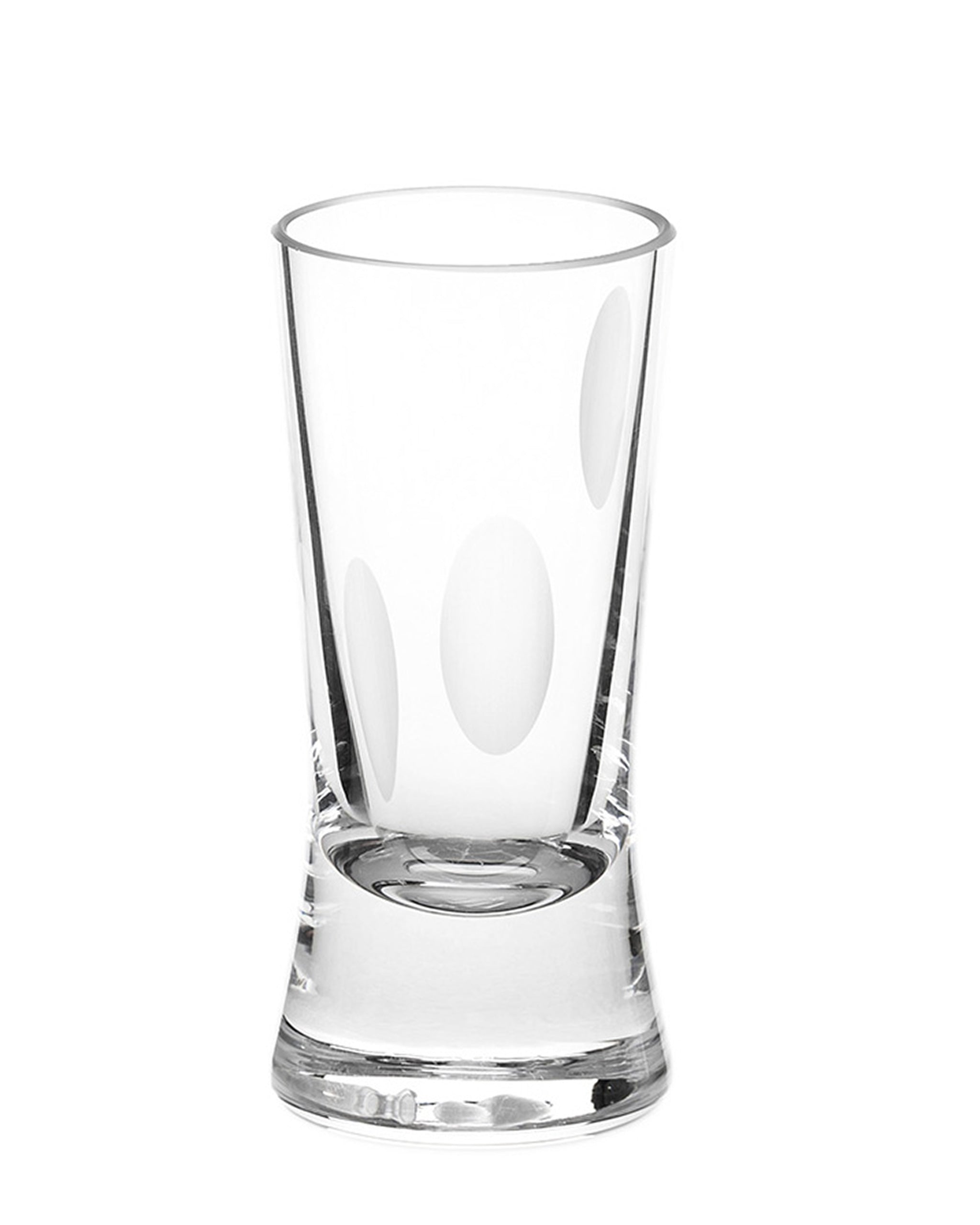 Unpolished hand-cut Irish crystal shot glass with softly polished and sandblasted dew-cut detailing on a white background