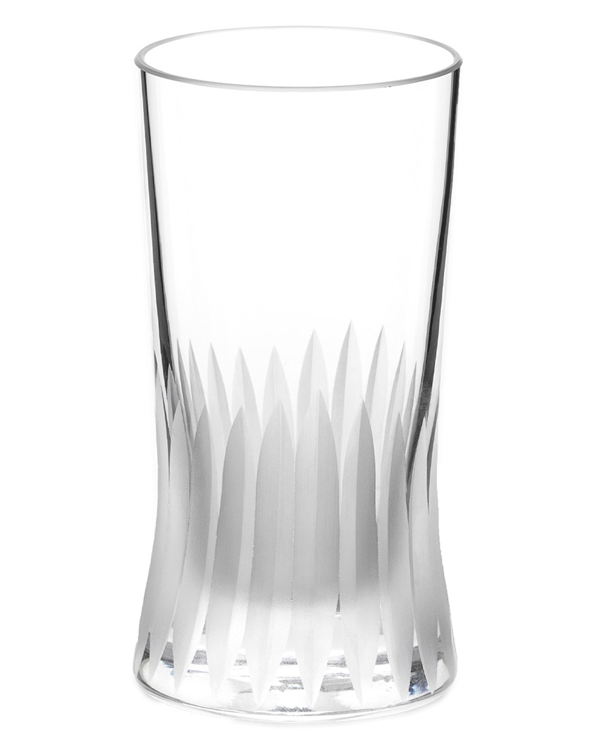 Unpolished hand-cut Irish crystal red wine glass with deep angular cuts inspired by ploughed soil on a white background