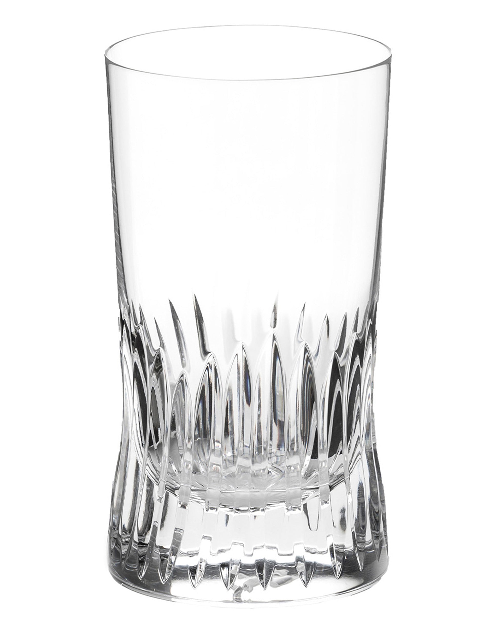 Polished hand-cut Irish crystal rocks tumbler glass with deep angular cuts inspired by ploughed soil on a white background