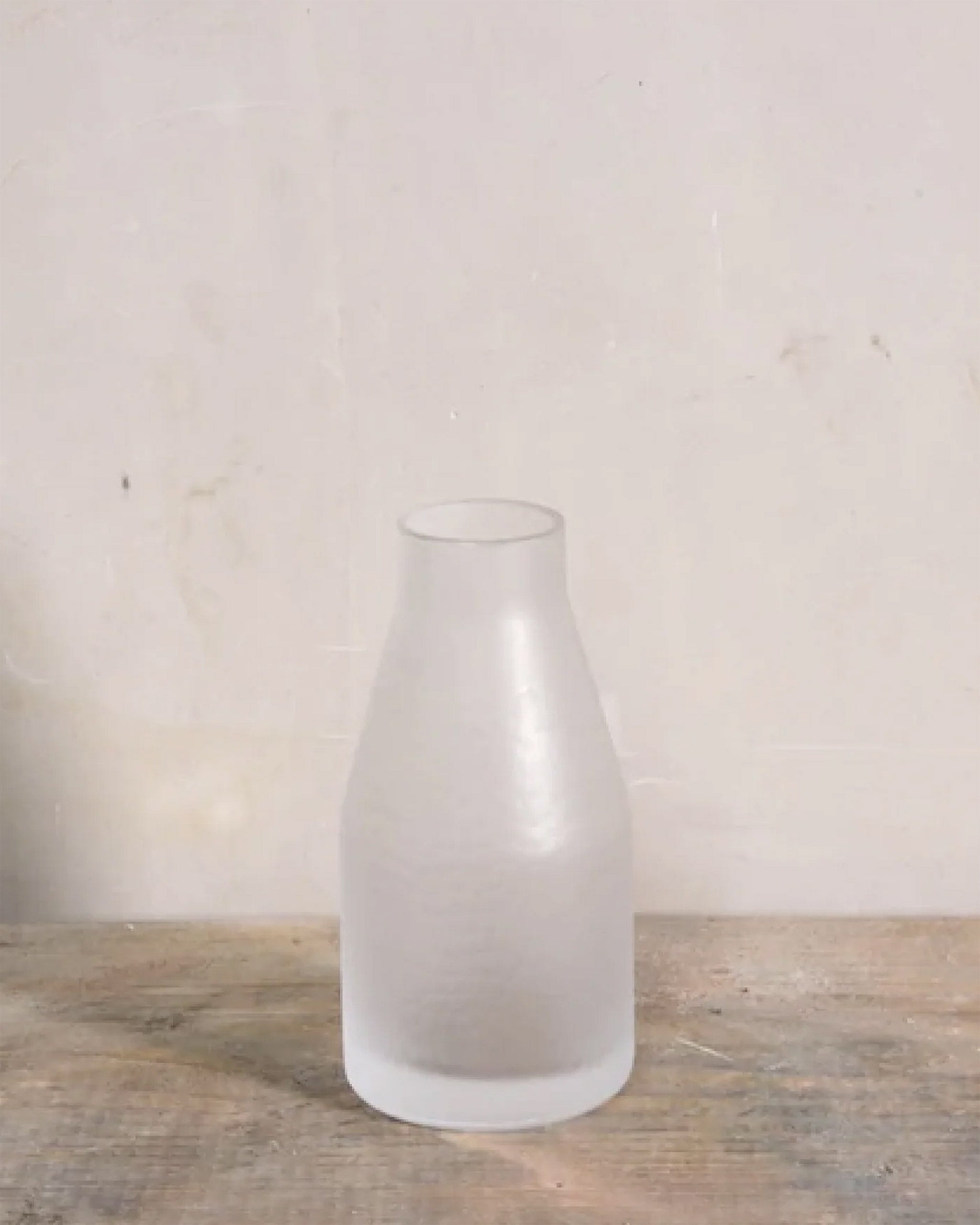 Elegant hand-blown Irish crystal carafe with softly obscured surface and rounded cuts, versatile for serving sake, wine, water, or juice.