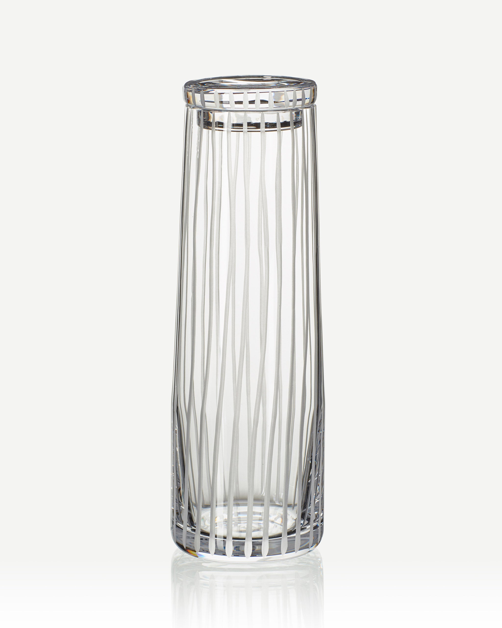 Hand-cut Irish crystal decanter with structured vertical cuts and broad base from the Row Collection, ideal for wine, sake, or cocktails on a white background