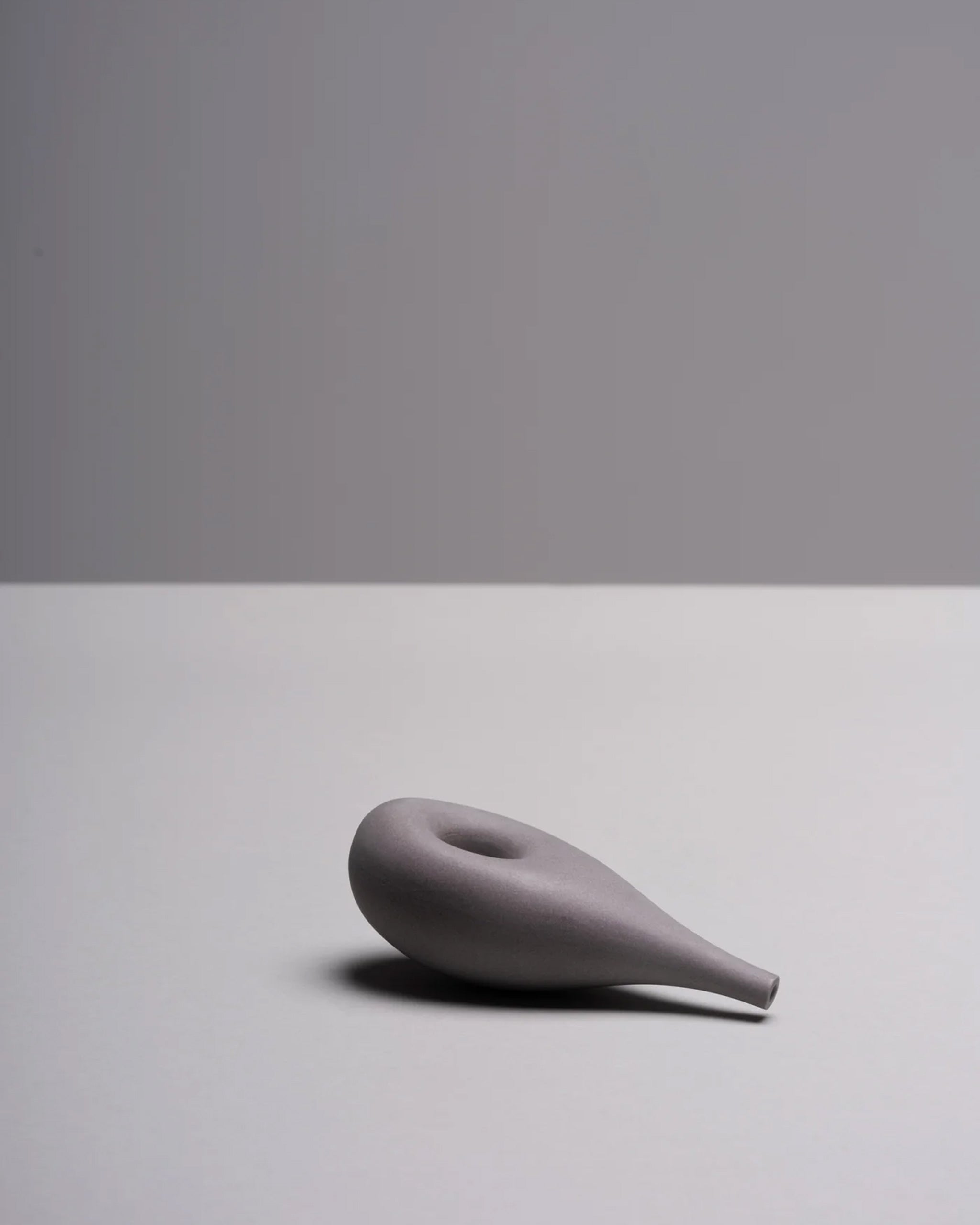 Porcelain Cloud Pipe photographed on a white background to highlight its sculptural, cloud-like form.
