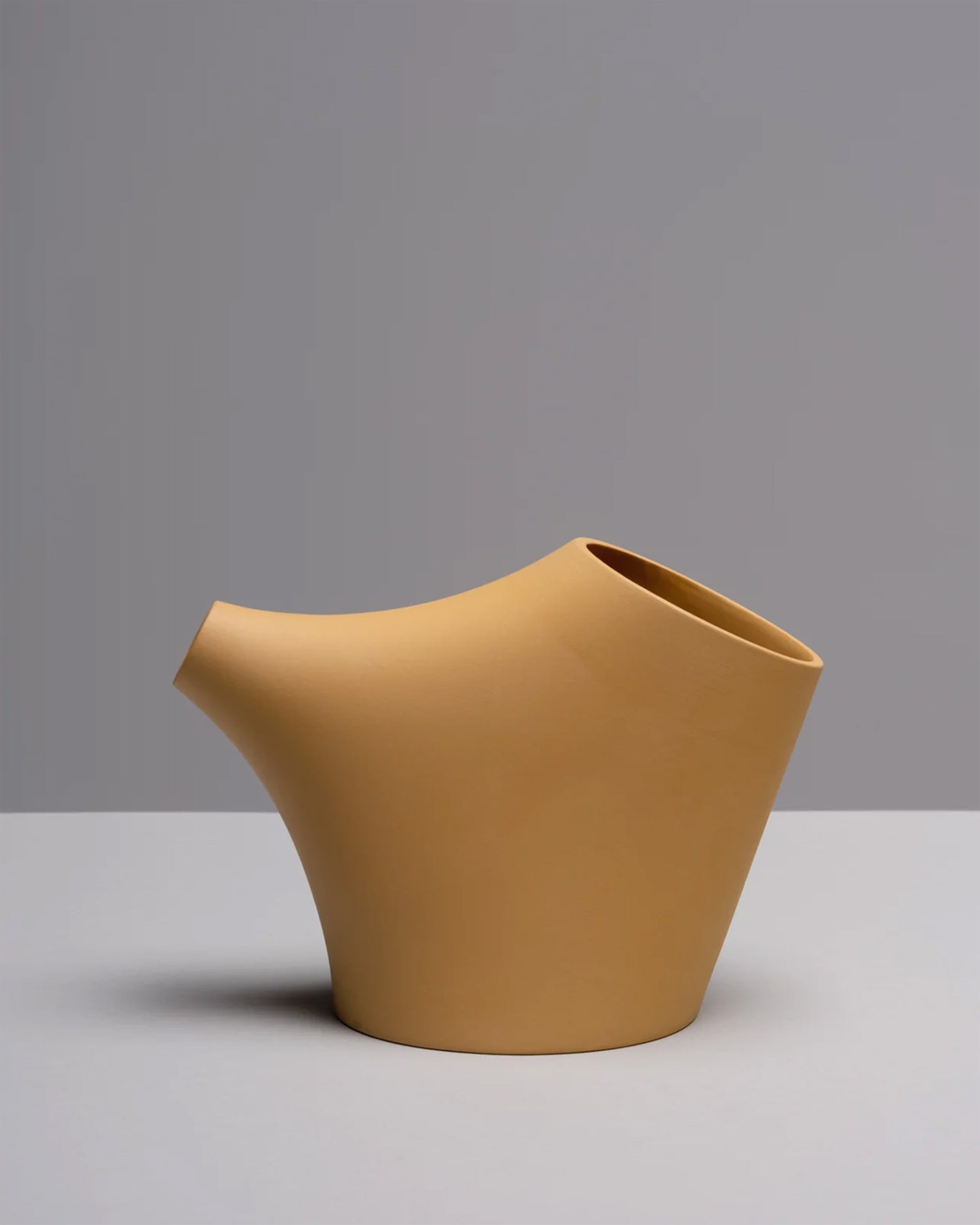 HopStep pot in ochre porcelain, perfect for oil, sake, tea or infusing shown on a white background.