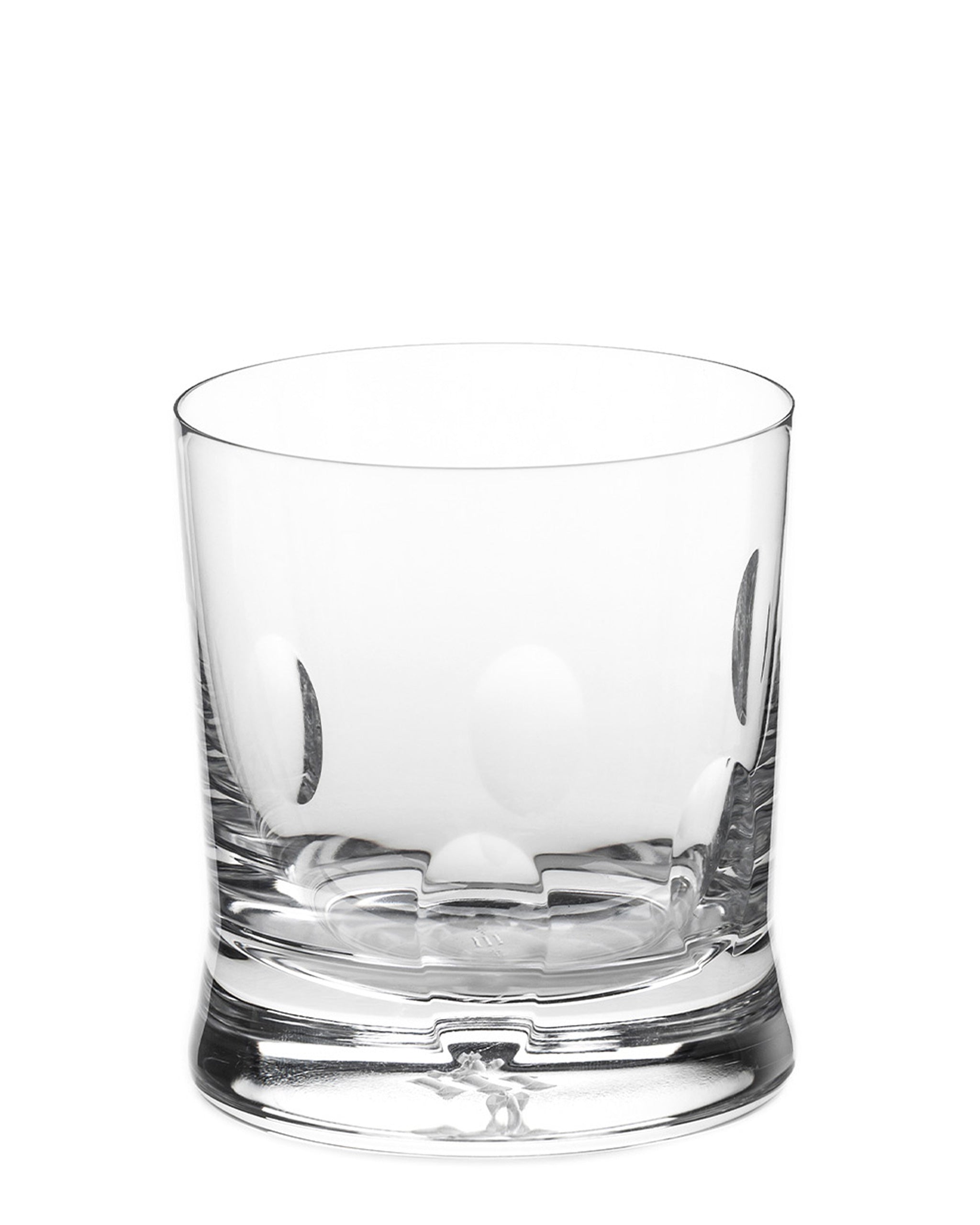 Polished hand-cut Irish crystal whiskey low glass with softly polished and sandblasted dew-cut detailing on a white background