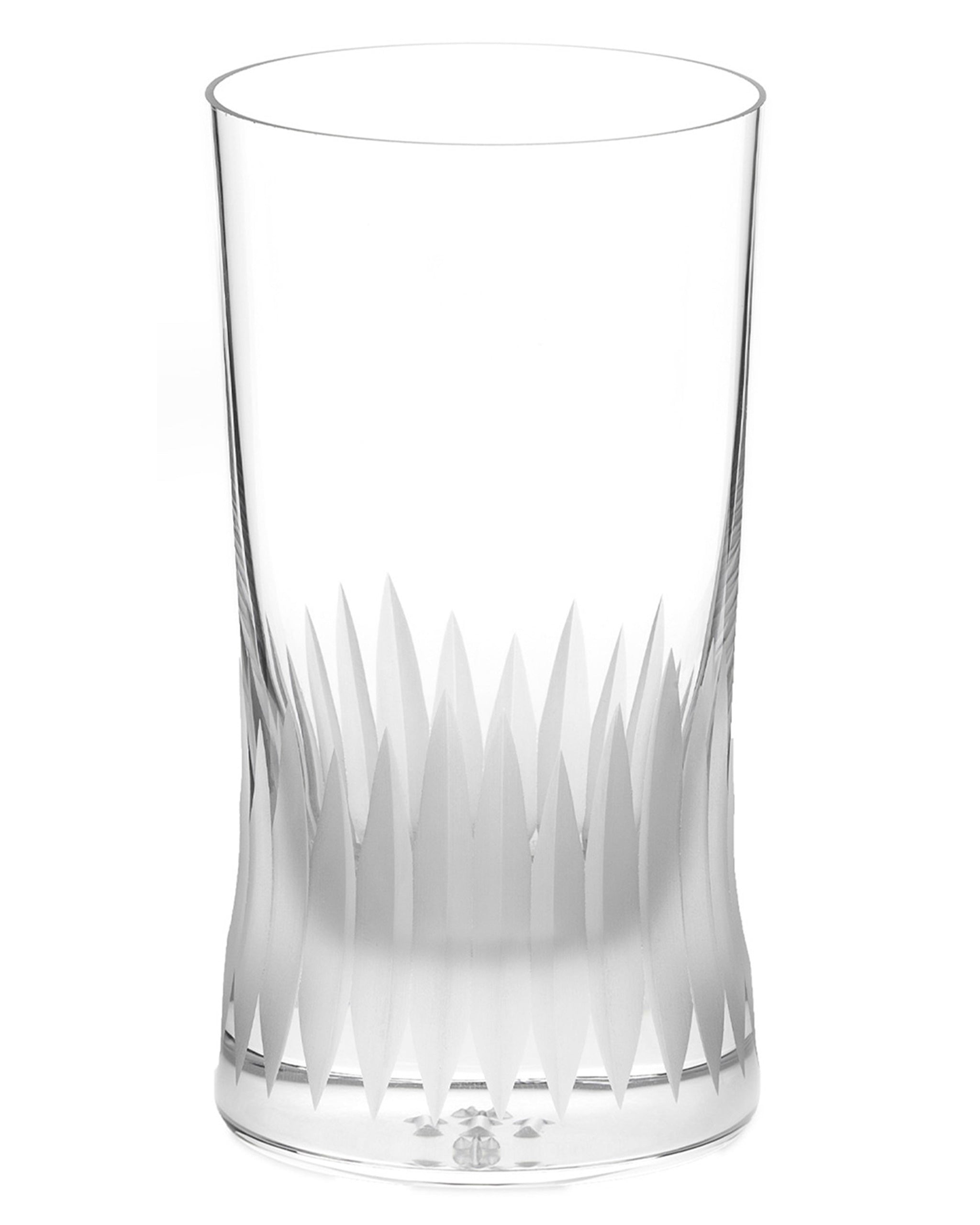 Unpolished hand-cut Irish crystal rocks tumbler glass with deep angular cuts inspired by ploughed soil on a white background