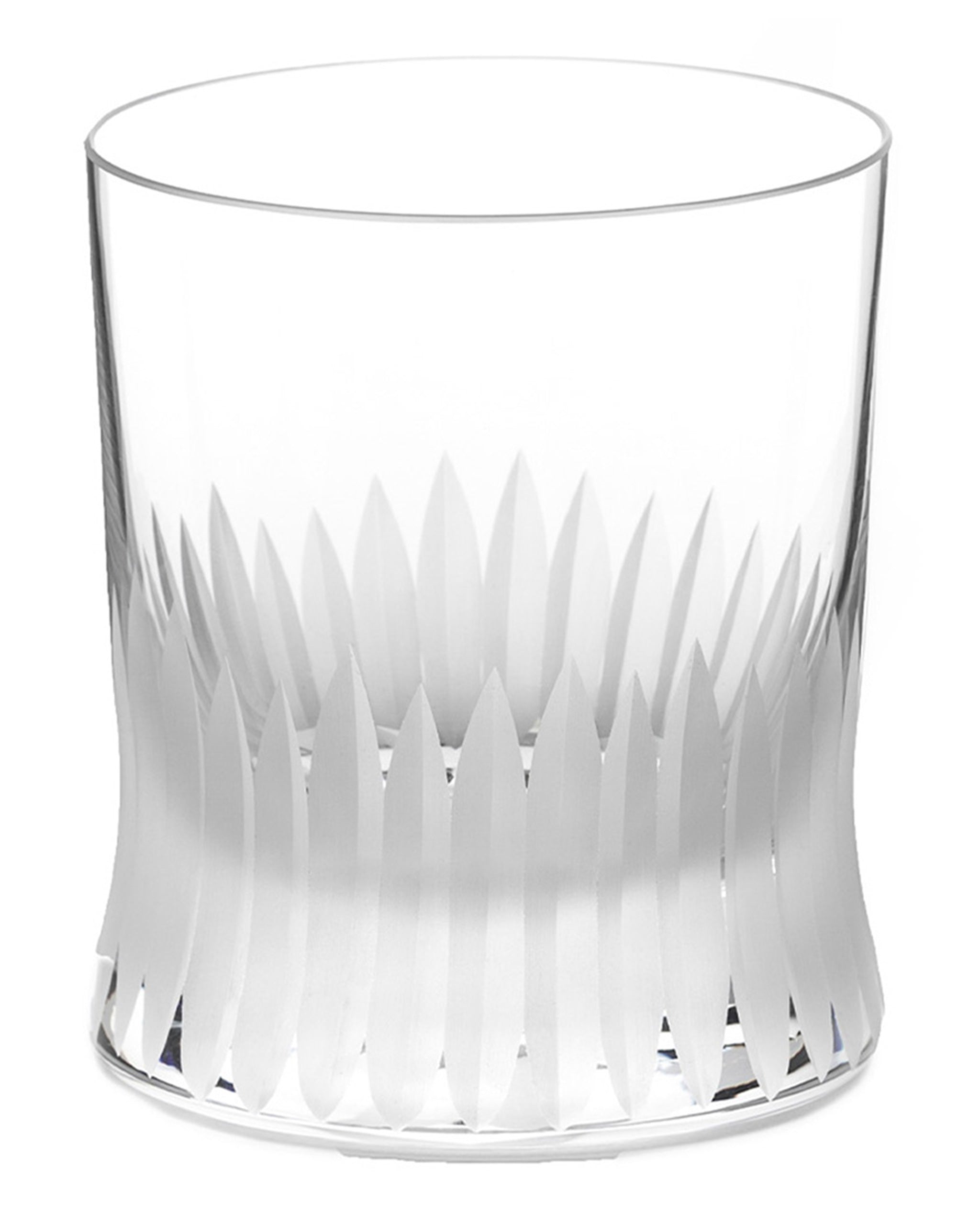 Unpolished hand-cut Irish crystal whiskey glass with deep angular cuts inspired by ploughed soil on a white background