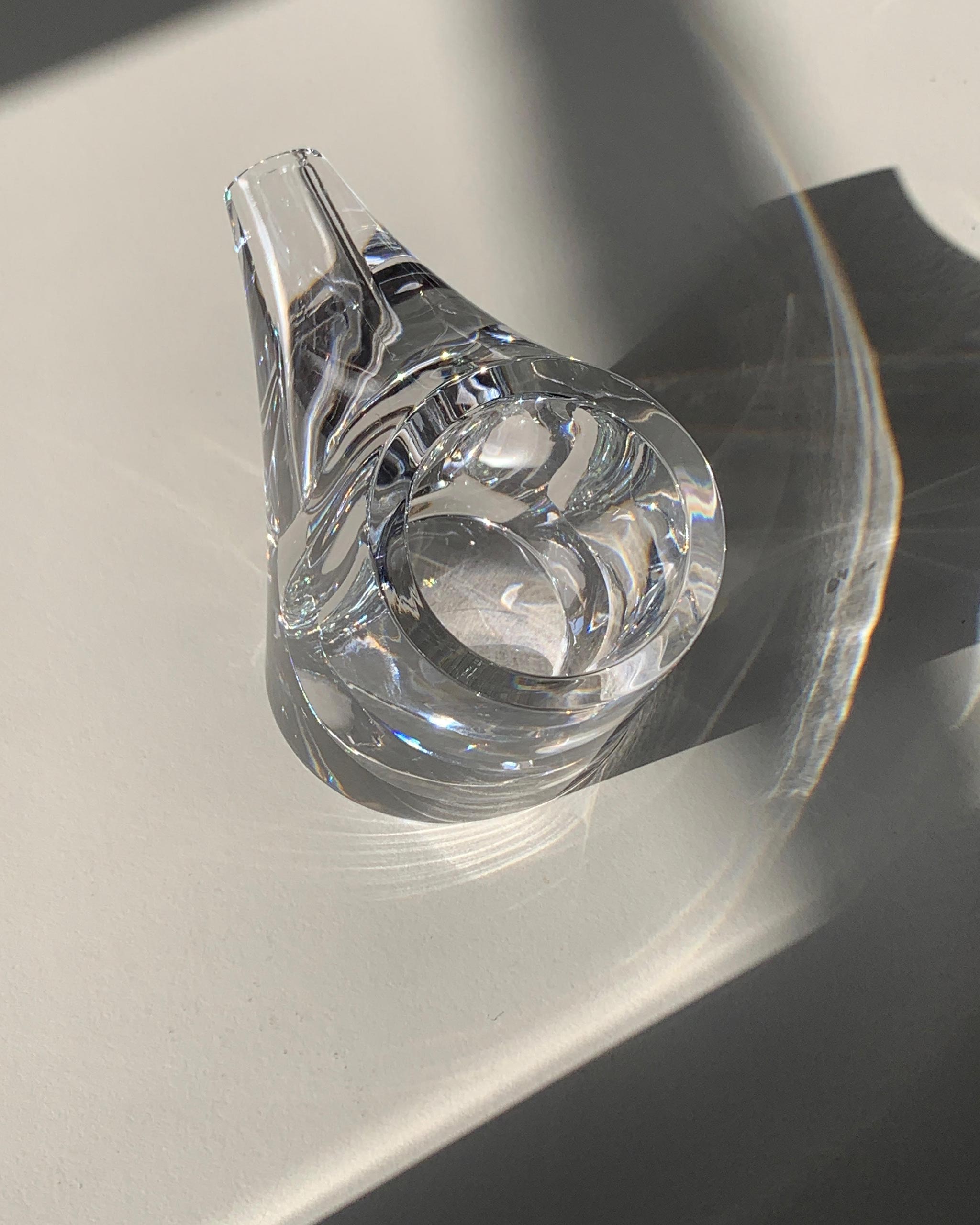 HopStep pot in lead crystal glass perfect for oil, sake, tea or infusing shown with light passing through to highlight details